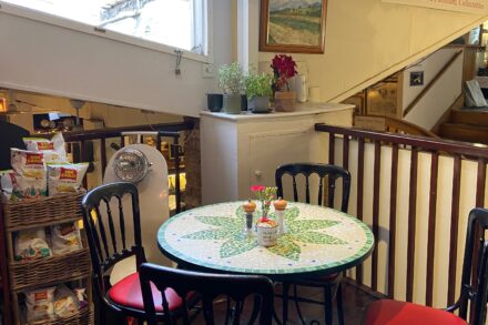 image of tables and chairs inside Caffe Antico o Old London Road Kingston