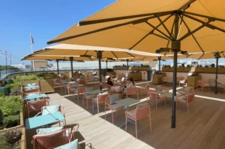 Rooftop bar with sun umbrellas