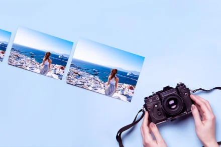 Printed photos in different sizes and camera