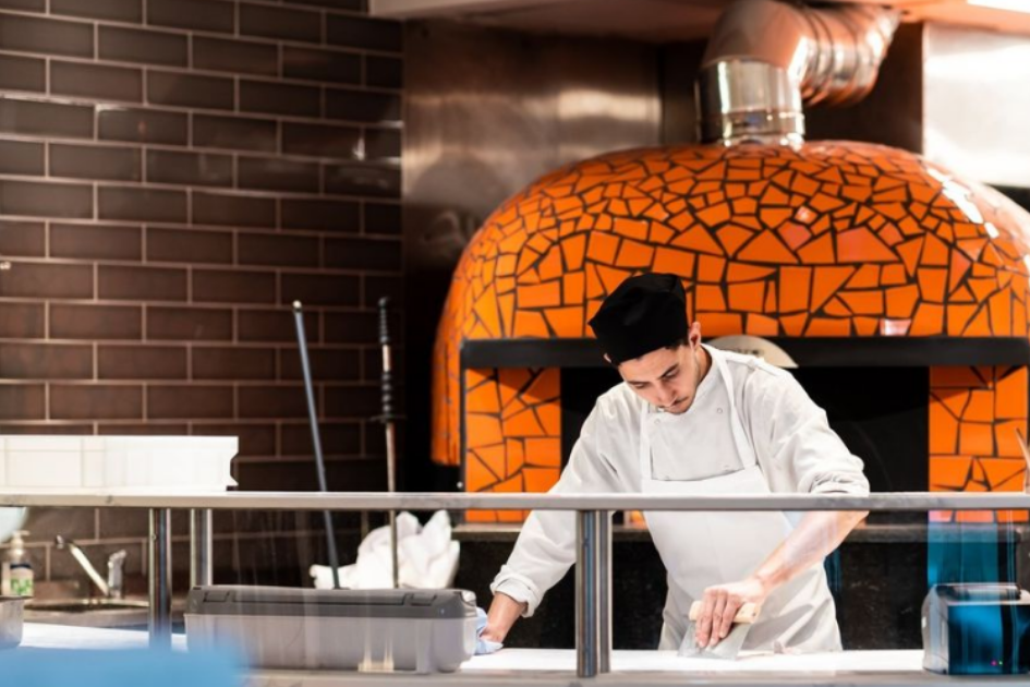 image of a chef making pizza at Eco restaurant in Kingston